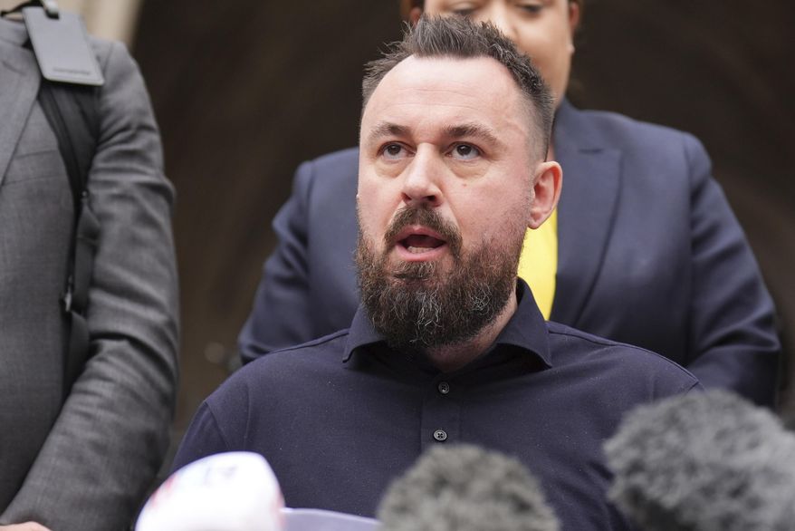 FILE - Martin Hibbert makes a statement outside the Royal Courts of Justice, central London, Thursday July 25, 2024. (James Manning/PA via AP, File)