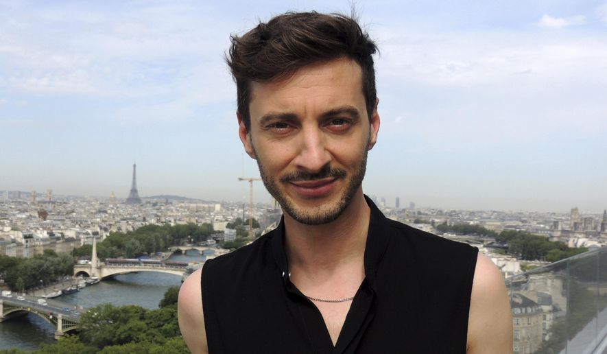 Thomas Jolly poses Friday, July 19, 2024 in Paris. (AP Photo/Tom Nouvian, File)