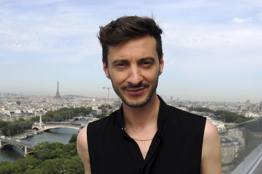 Thomas Jolly poses Friday, July 19, 2024 in Paris. (AP Photo/Tom Nouvian, File)