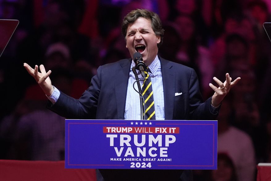 Tucker Carlson speaks before Republican presidential nominee former President Donald Trump at a campaign rally at Madison Square Garden, Sunday, Oct. 27, 2024, in New York. (AP Photo/Evan Vucci)