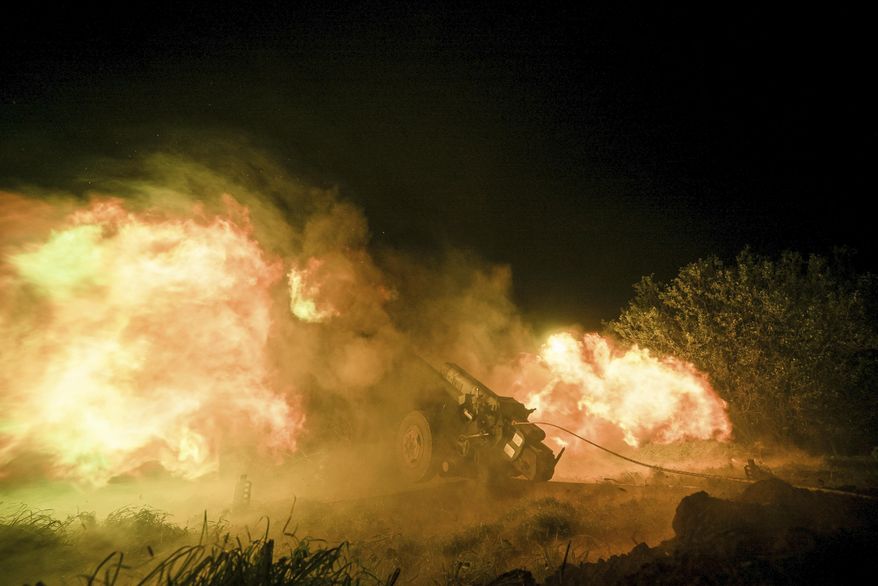 Ukrainian servicemen fire from a 122mm artillery cannon towards Russian positions in Kherson region, Ukraine, on Sunday, Oct. 27, 2024. (AP Photo/Marko Ivkov) **FILE**