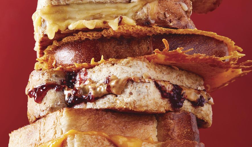 This image provided by Ghazalle Badiozamani shows a grilled cheese sandwich from the book "How to Cook Everything Kids" by Mark Bittman. (Ghazalle Badiozamani via AP)