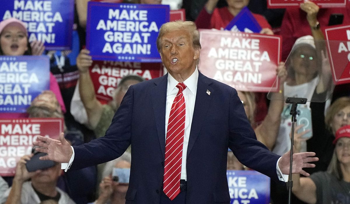 NextImg:Trump says Biden, Harris hate America after ‘garbage’ taunt of MAGA supporters