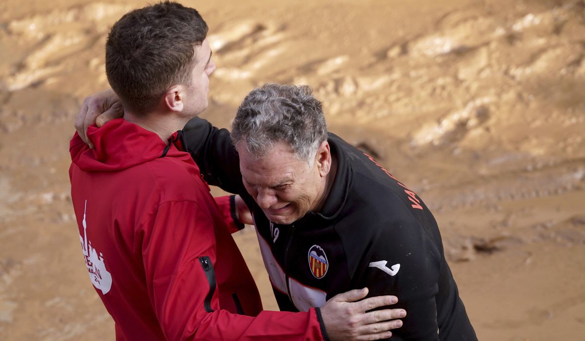 NextImg:Spain searches for bodies after flood of the century claims at least 95 lives