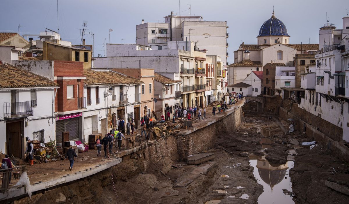 NextImg:Crashing waves in a hilltop village, a night of terror from Spain’s floods