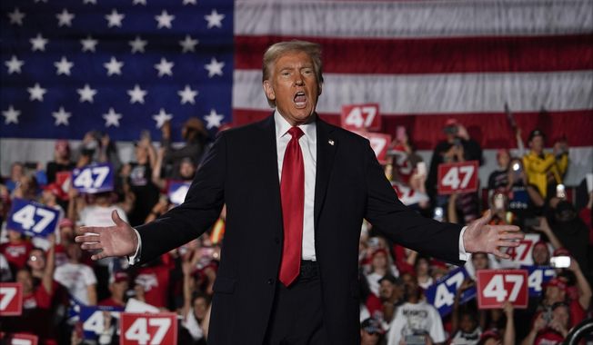 Republican presidential nominee former President Donald Trump arrives at a campaign rally at Macomb Community College, Friday, Nov. 1, 2024, in Warren, Mich. (AP Photo/Julia Demaree Nikhinson)