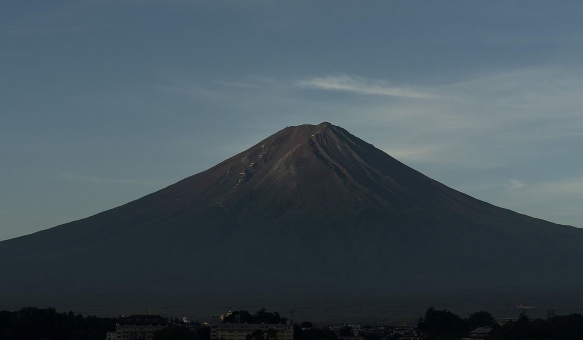 NextImg:Mount Fuji is still without its iconic snowcap for the first time in 130 years