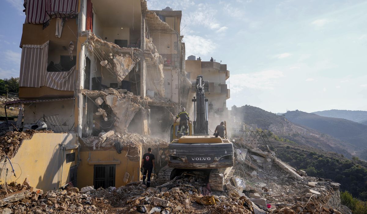 NextImg:Rescuers pull 30 bodies from a building in central Lebanon hit in an Israeli strike
