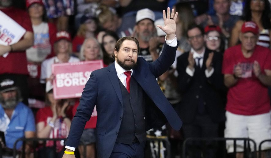 Arizona 2nd Congressional District Republican Rep. Eli Crane arrives on stage to speak at a campaign rally, Oct. 13, 2024, in Prescott Valley, Ariz. (AP Photo/Ross D. Franklin, File)