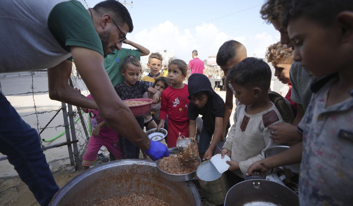 NextImg:Hungry Palestinians in north Gaza search for food, sealed off from aid for a month by Israeli siege