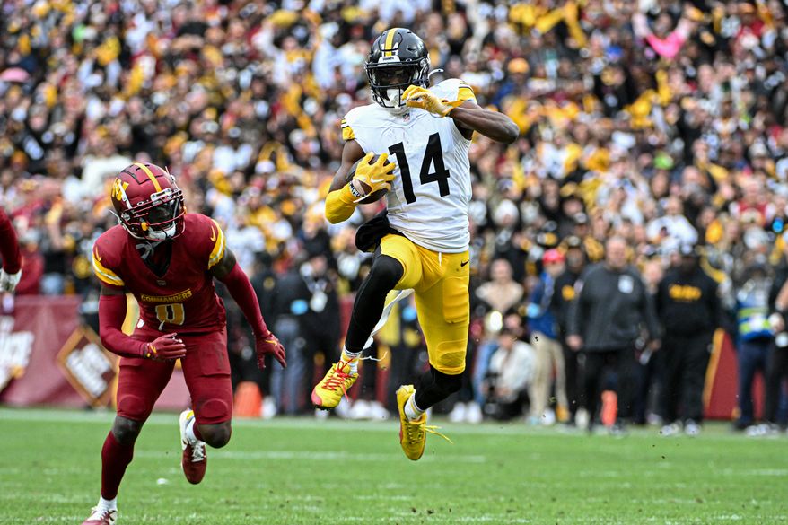 Pittsburgh Steelers wide receiver George Pickens (14) running with the ball after catching a pass during the second half of an NFL game against the Washington Commanders at Northwest Stadium in Landover, MD, November 10, 2024. (Photo for the Washington Times)