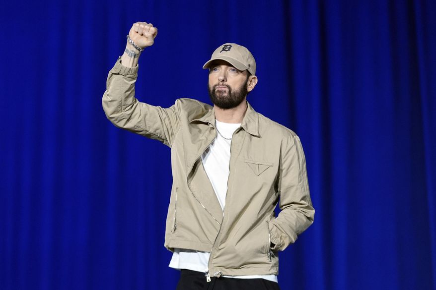 Rapper Eminem appears at a campaign rally supporting Democratic presidential nominee Vice President Kamala Harris in Detroit on Oct. 22, 2024. (AP Photo/Paul Sancya, File)