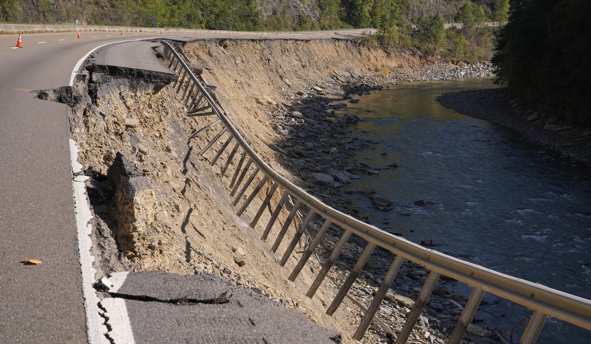 NextImg:Driver dies after crashing on hurricane-damaged highway in North Carolina
