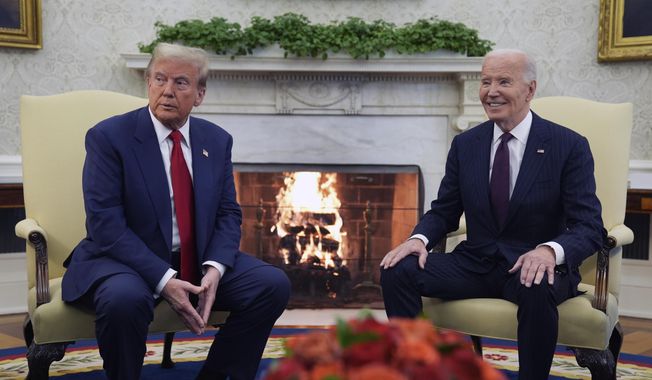 President Joe Biden meets with President-elect Donald Trump in the Oval Office of the White House, Wednesday, Nov. 13, 2024, in Washington. (AP Photo/Evan Vucci)