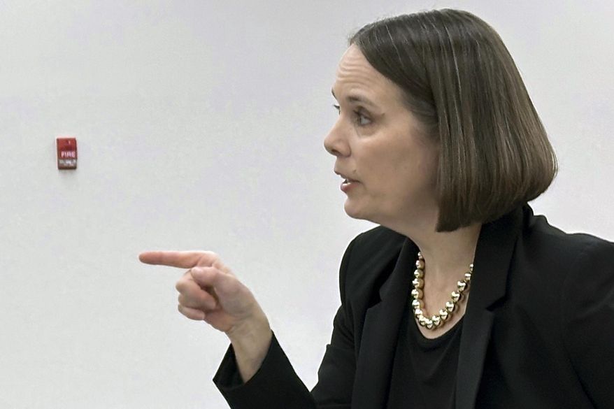 Maine Secretary of State Shenna Bellows addresses attorneys and campaign staffers as election workers scan ballots for ranked choice voting, Tuesday, Nov. 12, 2024, in Augusta, Maine. (AP Photo/David Sharp)