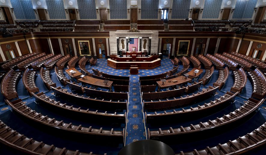 The chamber of the House of Representatives is seen at the Capitol in Washington, Feb. 28, 2022. In the 2024 elections, Republicans have won enough seats to control the U.S. House, completing the party's sweep into power and securing their hold on U.S. government alongside President-elect Donald Trump. (AP Photo/J. Scott Applewhite, File)