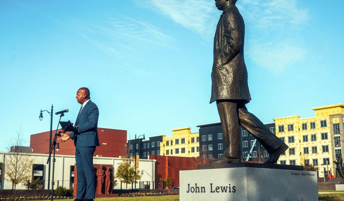NextImg:Statue of the late U.S. Rep. John Lewis, a civil rights icon, is unveiled in Alabama’s capital city
