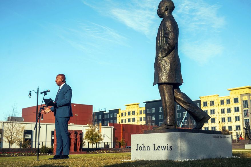 This image provided by the Equal Justice Initiative, Bryan Stevenson, Founder and Executive Director, Equal Justice Initiative, speaks during the unveiling of a a statue of U.S. Rep. John Lewis, a civil rights icon, at the Equal Justice Initiative's Legacy Plaza, Tuesday, Nov. 12, 2024, in Montgomery, Ala. (Equal Justice Initiative via AP)
