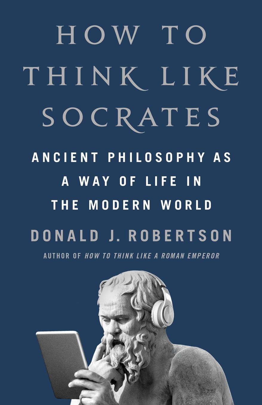 This cover image released by St. Martin's Press shows "How to Think Like Socrates: Ancient Philosophy as a Way of Life in the Modern World" by Donald J. Robertson. (St. Martin's Press via AP)