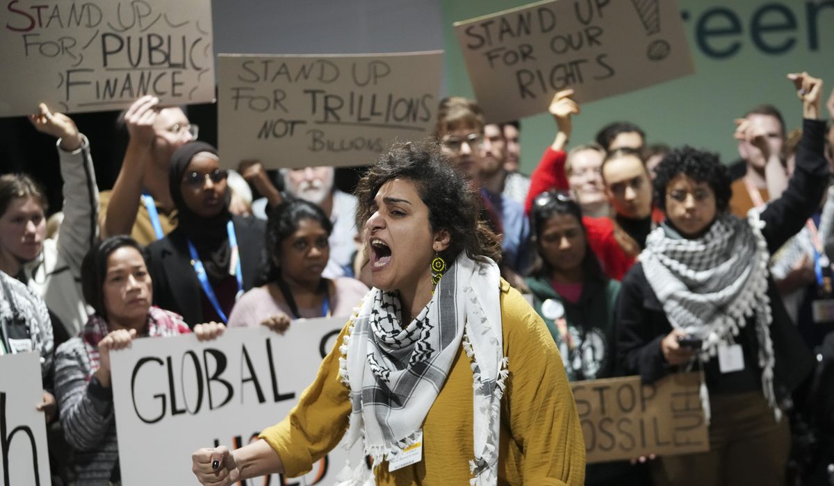 NextImg:Negotiators work through the night at U.N climate talks to try to reach a cash deal for poor nations