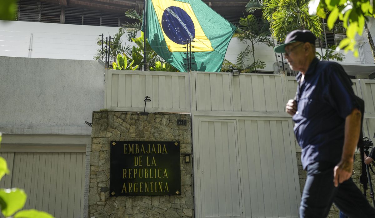 NextImg:Sheltered Venezuelan government opponents decry police and intelligence agents outside embassy