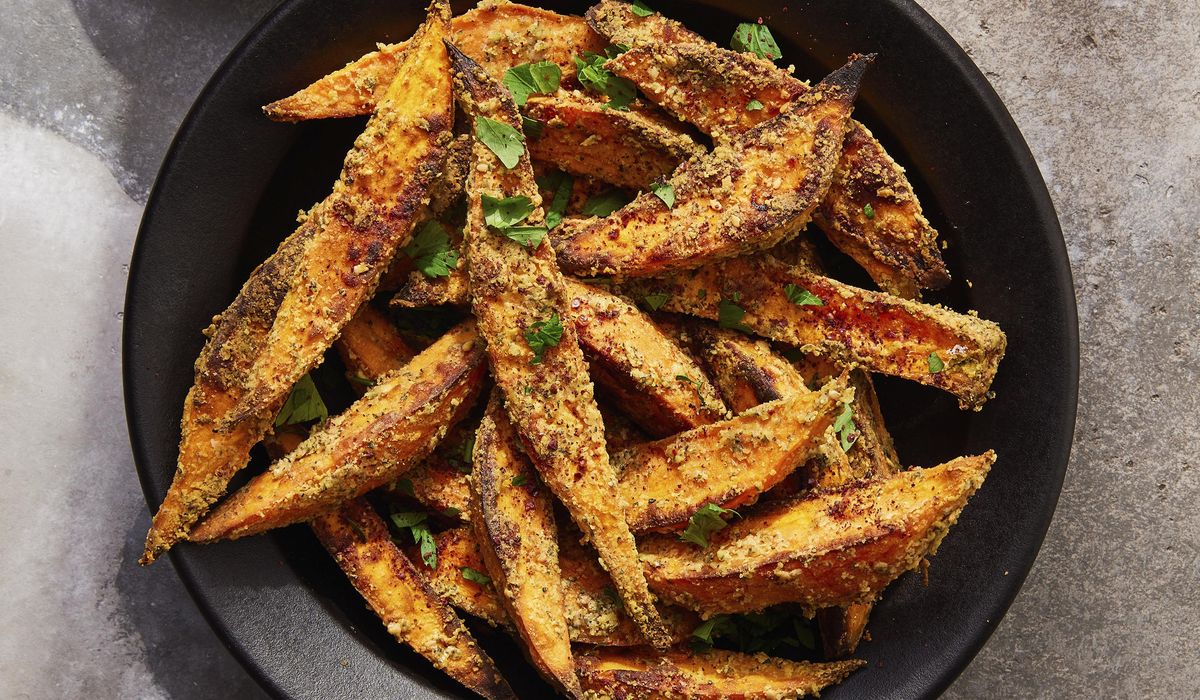 NextImg:A Middle Eastern twist on a Thanksgiving staple: Tahini-roasted sweet potatoes with za’atar