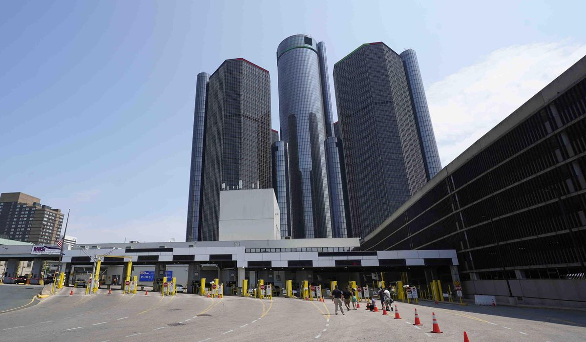NextImg:Losses in China lead to $5 billion charge for General Motors as it cuts the value of its assets