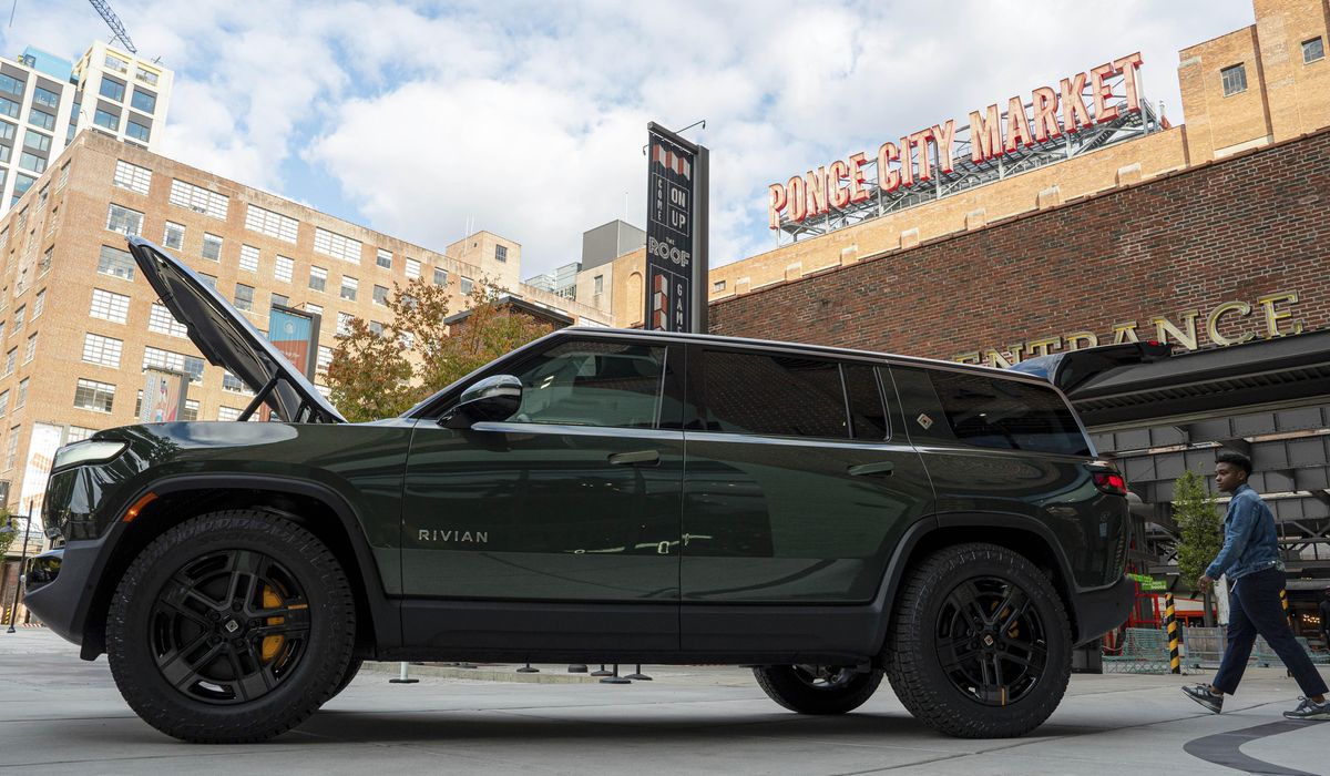 NextImg:Biden administration will loan $6.6 billion to Rivian to build Georgia factory that automaker paused