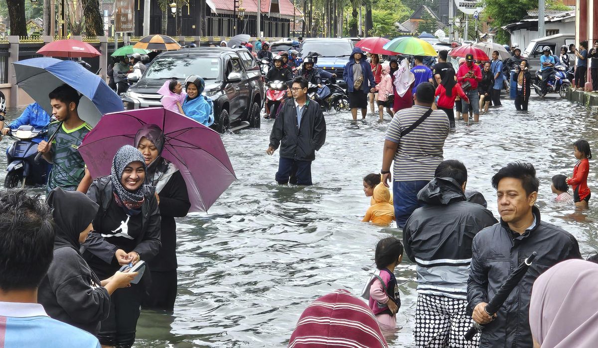 NextImg:3 dead and more than 90,000 displaced as Malaysia prepares for its worst floods in a decade