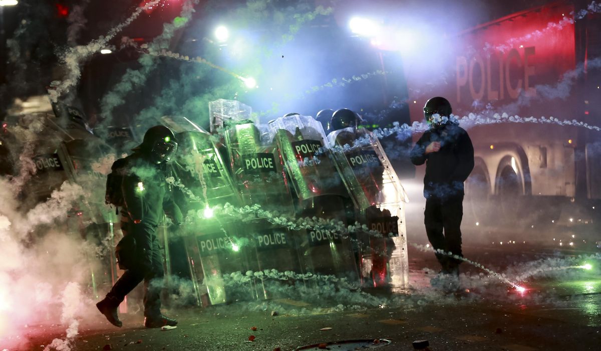 NextImg:Protesters gather for third night of demonstrations after Georgia announces suspension of E.U. talks