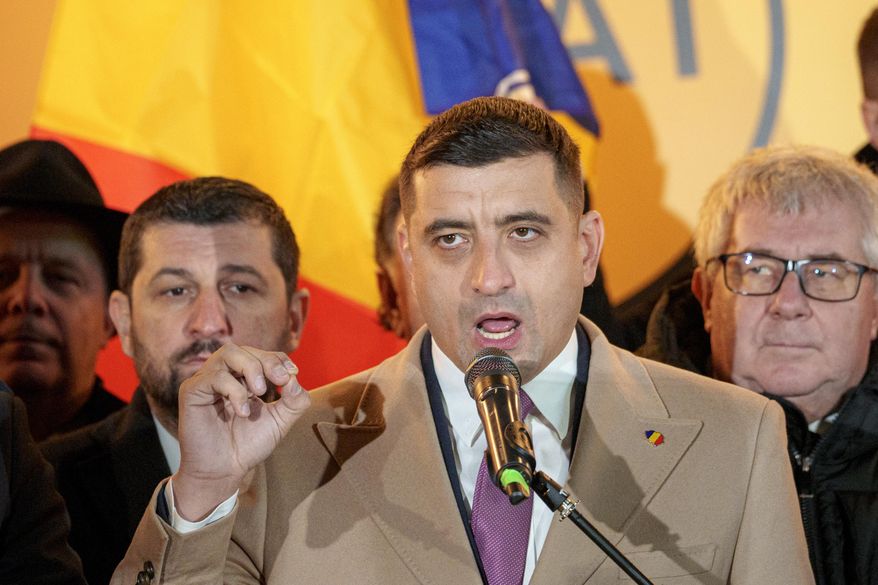 George Simion, leader of the Alliance for the Unity of Romanians (AUR) speaks to media after polls closed during the country's parliamentary elections, in Bucharest, Romania, Sunday, Dec. 1, 2024. (AP Photo/Andreea Alexandru)