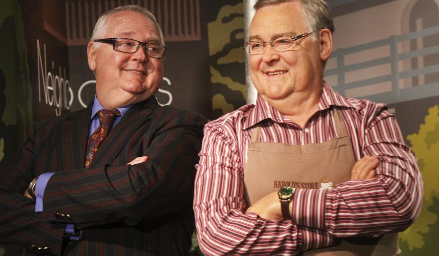 Australian actor Ian Smith, left, poses for a photograph with his wax figure in the character of Harold Bishop from Australian soap "Neighbours" at Madame Tussauds waxworks in Sydney, April 16, 2012. (April Fonti/AAP Image via AP)