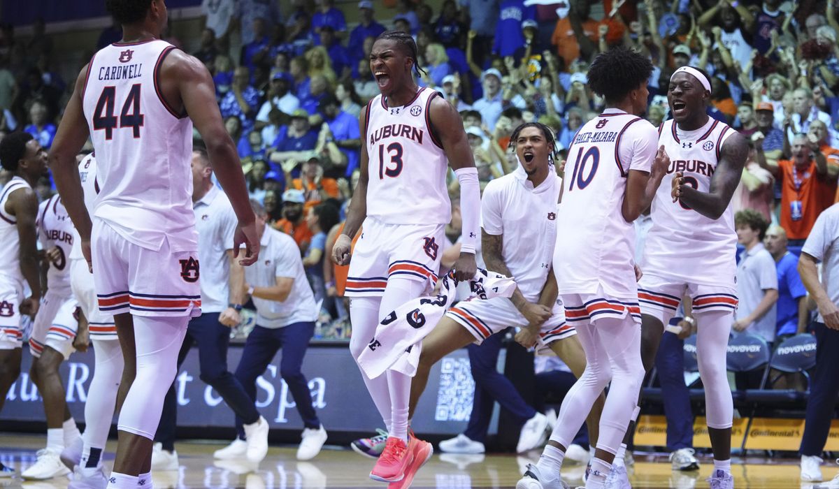 NextImg:Kansas holds off Auburn for No. 1 in Top 25 as SEC grabs 3 of top 4 spots