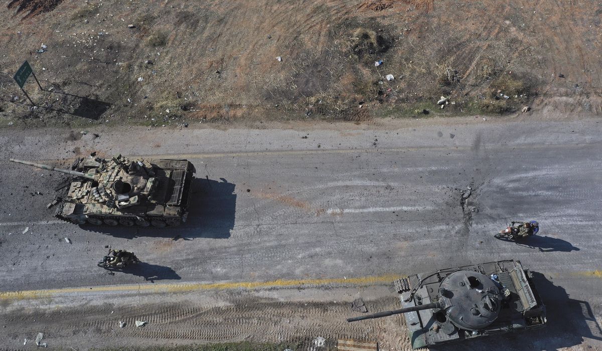 NextImg:Syrian forces battling insurgents north of strategic city of Hama