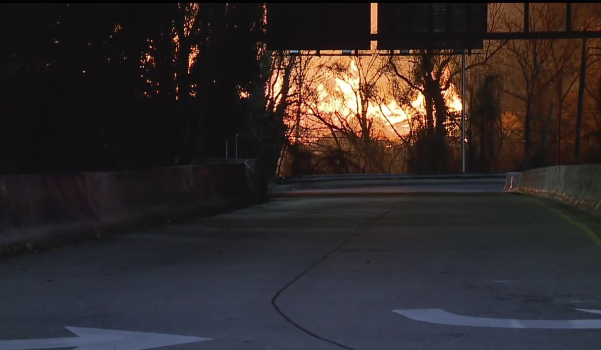NextImg:Wind-driven brushfire at Baltimore wood recycling yard closes expressway, light rail, schools