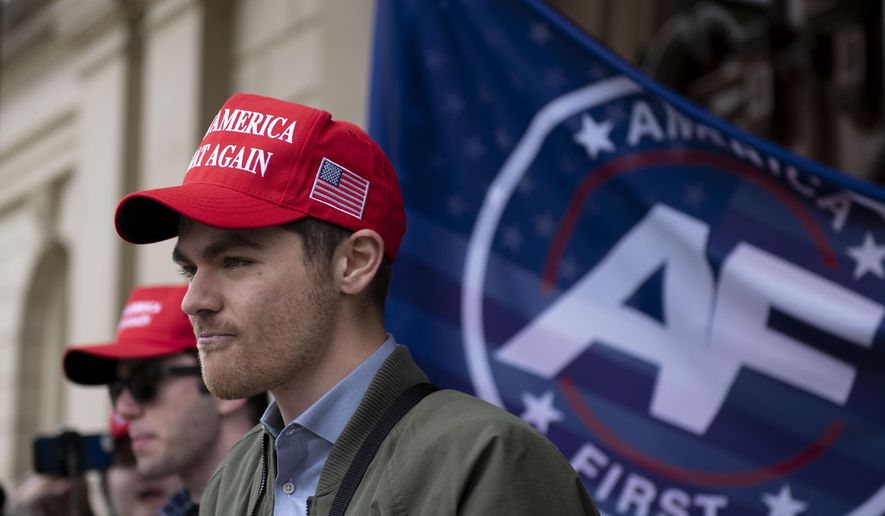 Nick Fuentes, far right activist, holds a rally at the Lansing Capitol, in Lansing, Mich., Wednesday, Nov. 11, 2020. (Nicole Hester/Mlive.com/Ann Arbor News via AP, File)