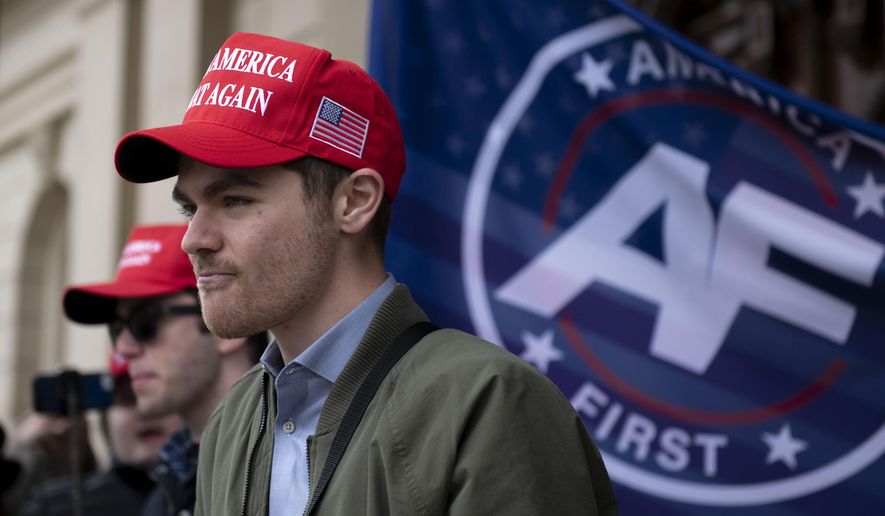 Nick Fuentes, far right activist, holds a rally at the Lansing Capitol, in Lansing, Mich., Wednesday, Nov. 11, 2020. (Nicole Hester/Mlive.com/Ann Arbor News via AP, File)
