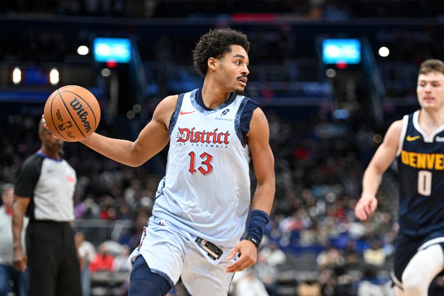 Washington Wizards guard Jordan Poole (13) with the ball during the third quarter of an NBA game against the Denver Nuggets at Capital One Arena in Washington D.C., December 7, 2024. (Photo for the Washington Times)
