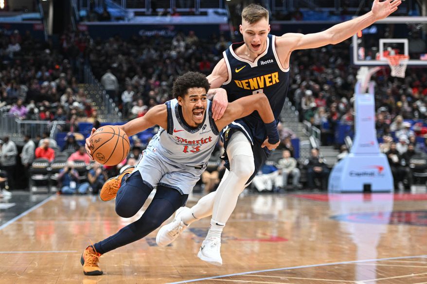 Washington Wizards guard Jordan Poole (13) driving towards the hoop during the third quarter of an NBA game against the Denver Nuggets at Capital One Arena in Washington D.C., December 7, 2024. (Photo for the Washington Times)
