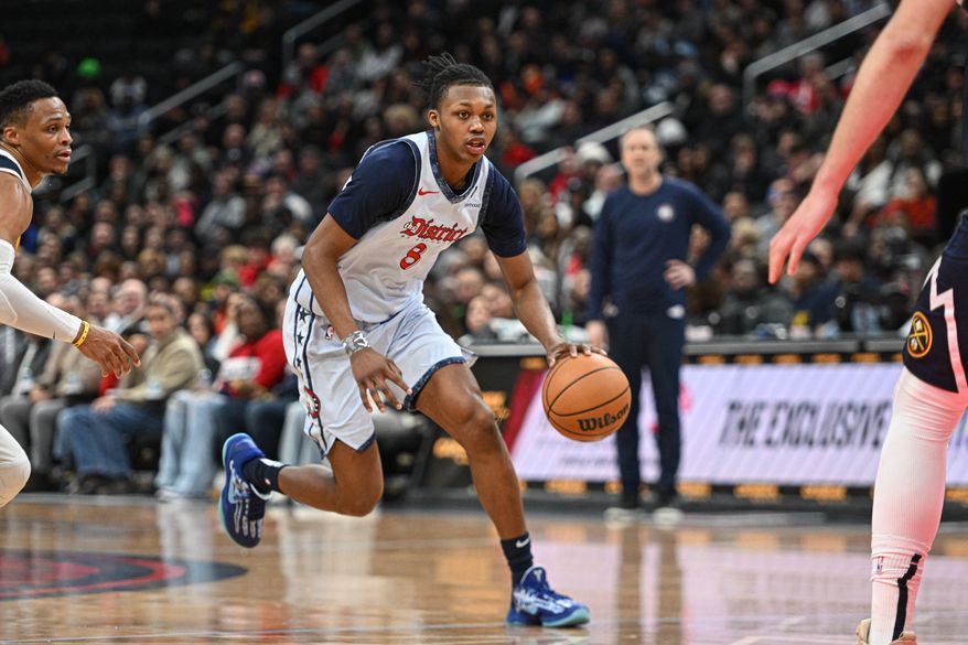 Washington Wizards guard Bub Carrington (8) dribbling the ball during the fourth quarter of an NBA game against the Denver Nuggets at Capital One Arena in Washington D.C., December 7, 2024. (Photo for the Washington Times)