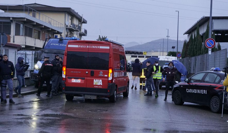 Emergency services work on a site of a fuel depot's explosion in Calenzano, near Florence, Italy, Monday, Dec. 9, 2024. (Alessandro La Rocca/LaPresse via AP)