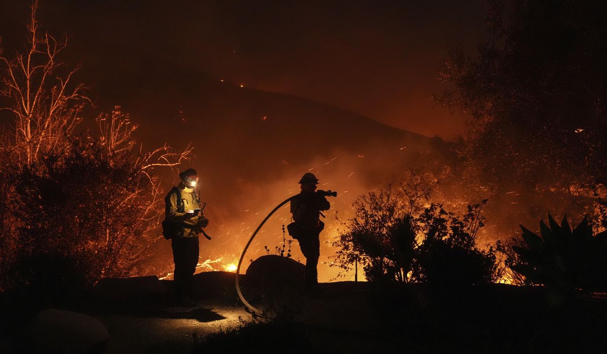 NextImg:A Malibu wildfire prompts evacuation orders and warnings for 20,000, including Dick Van Dyke, Cher