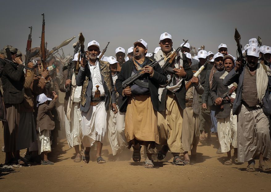 Houthi fighters march during a rally of support for the Palestinians in the Gaza Strip and against the U.S. strikes on Yemen outside Sanaa on Monday, Jan. 22, 2024. (AP Photo)