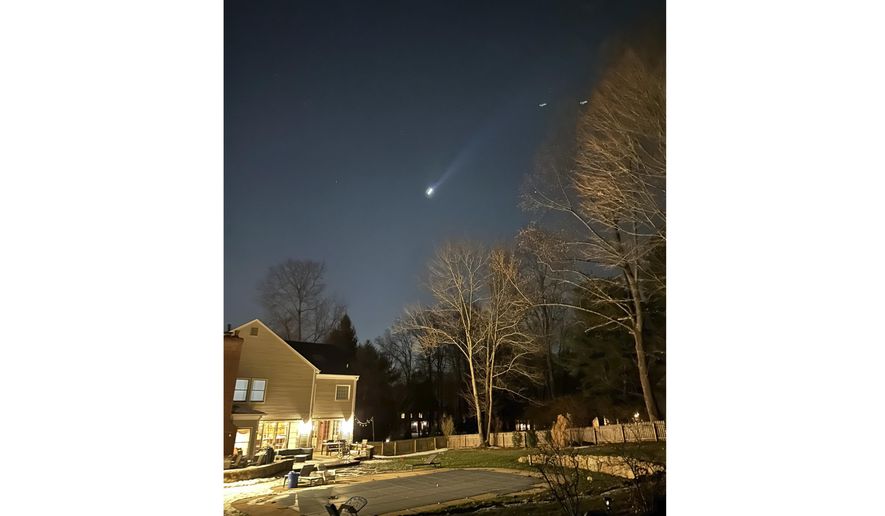 This photo provided by Brian Glenn shows what appears to be multiple drones flying over Bernardsville, N.J., on Thursday, Dec. 5, 2024 (Brian Glenn/TMX via AP, File)