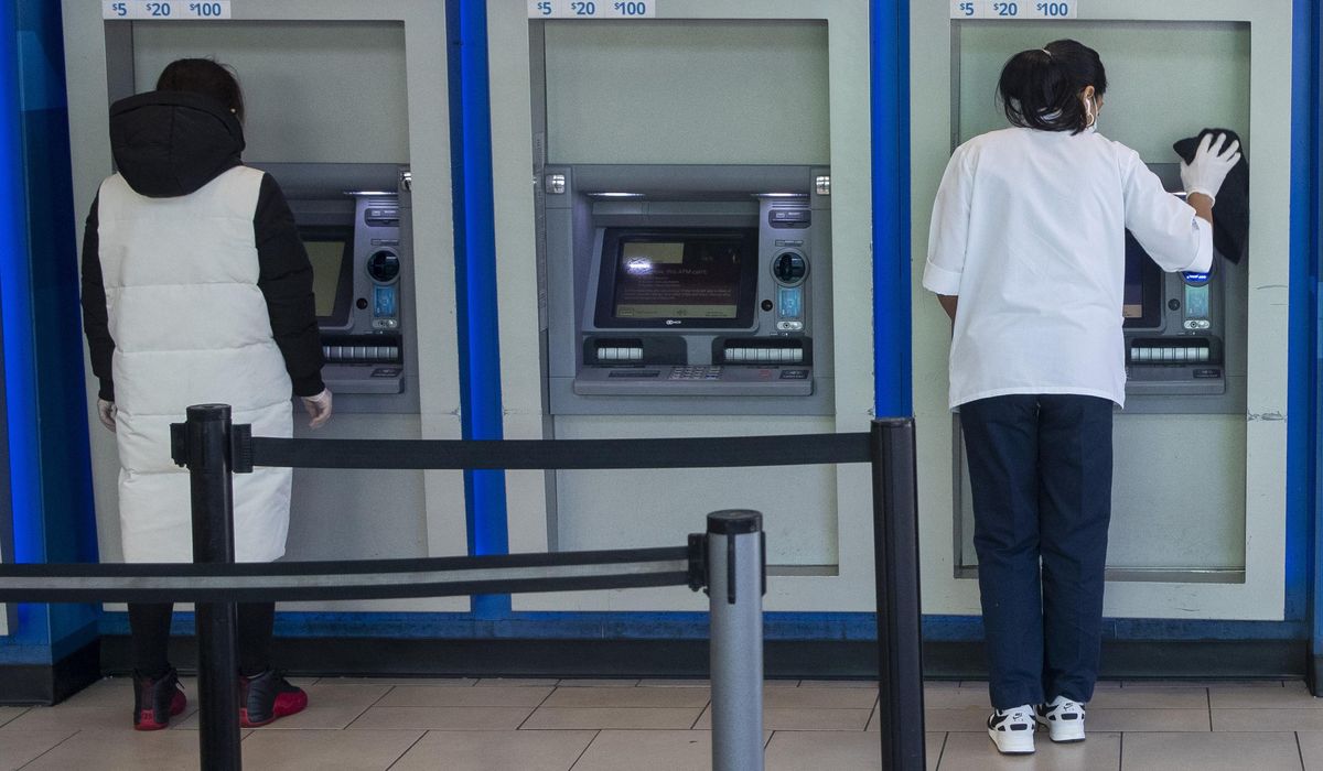 NextImg:Bank groups sue the Consumer Financial Protection Bureau over a proposed cap on overdraft fees