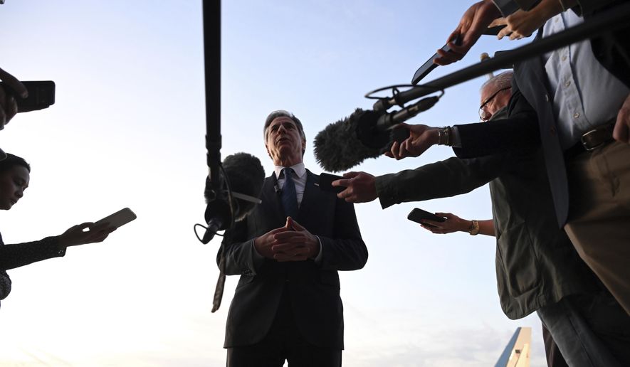 US Secretary of State Antony Blinken speaks to reporters on the tarmac before his departure from King Hussein International Airport in Jordan's southern Red Sea coastal city of Aqaba, Jordan, Thursday, Dec. 12, 2024. (Andrew Caballero-Reynolds/Pool Photo via AP)