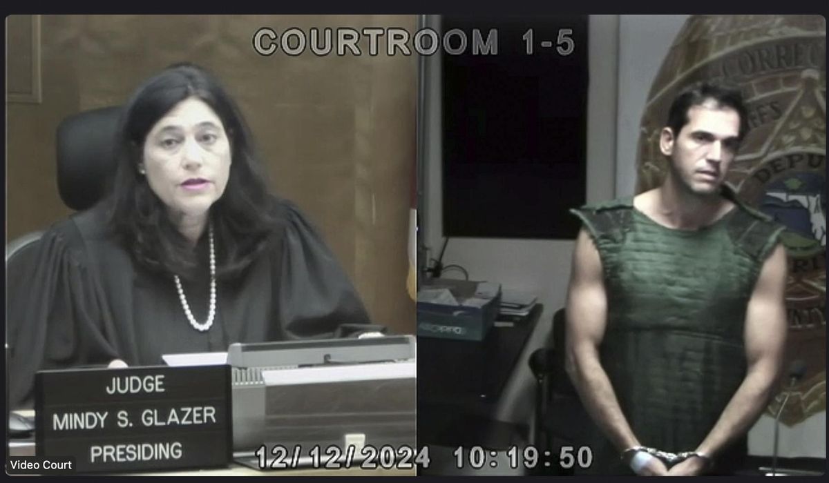 NextImg:Luxury real estate broker and his twin held without bail on sex trafficking charges