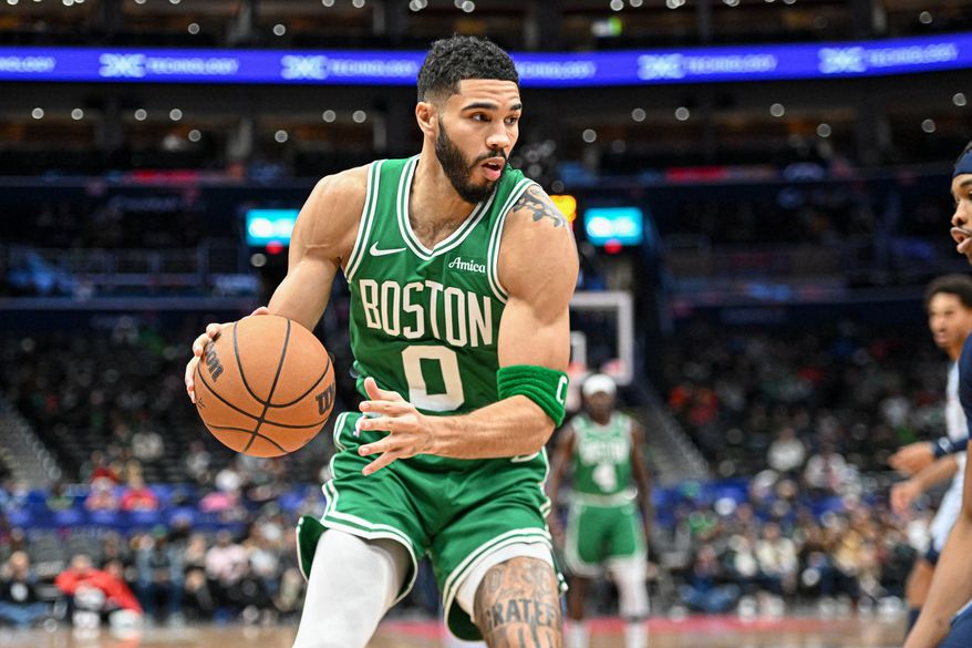 Boston Celtics forward Jayson Tatum (0) dribbling the ball during the first quarter of an NBA game against the Washington Wizards at Capital One Arena in Washington D.C., December 15, 2024. (Photo for the Washington Times)