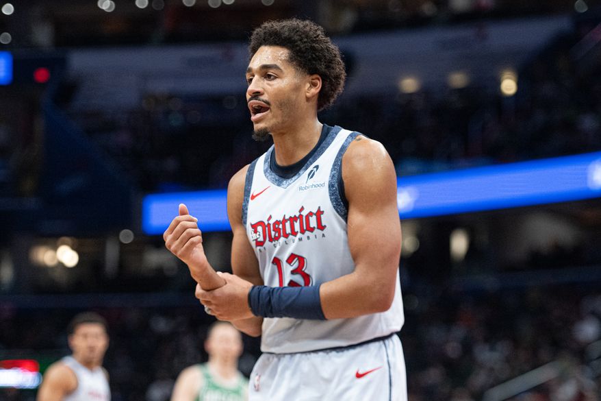 Washington Wizards guard Jordan Poole (13) discussing a foul call with the ref during the first quarter of an NBA game against the Boston Celtics at Capital One Arena in Washington D.C., December 15, 2024. (Photo for the Washington Times)