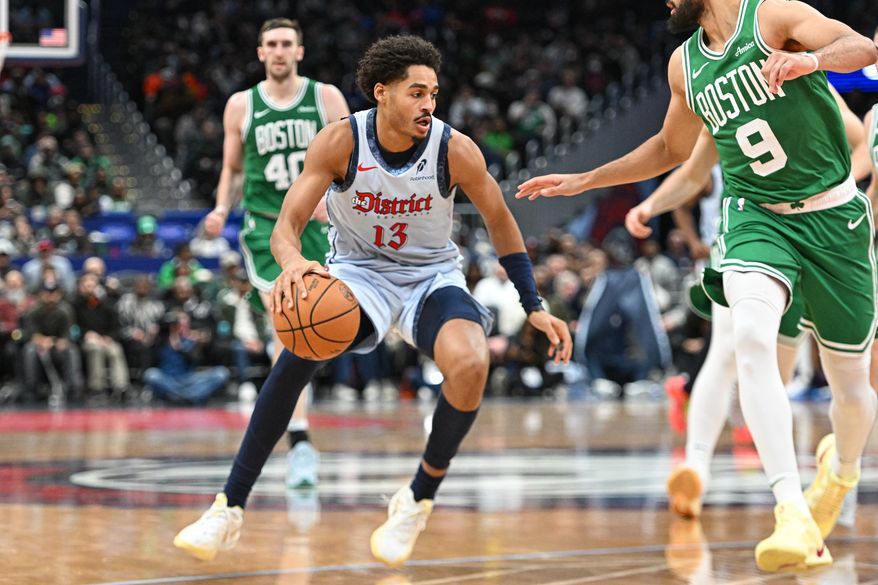 Washington Wizards guard Jordan Poole (13) dribbling the ball during the fourth quarter of an NBA game against the Boston Celtics at Capital One Arena in Washington D.C., December 15, 2024. (Photo for the Washington Times)